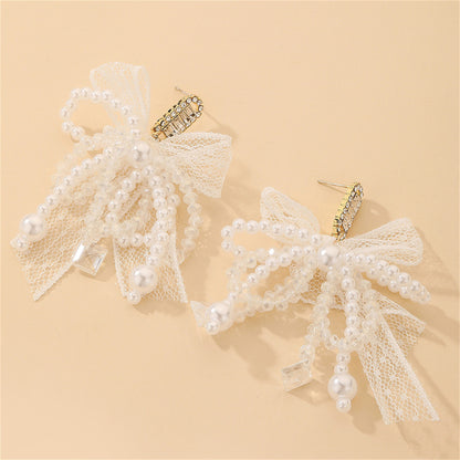 Cubic Zirconia and Crystal Pearl Silver-Plated Bow Drop Earrings, silver drop earrings for women, lifestyle look