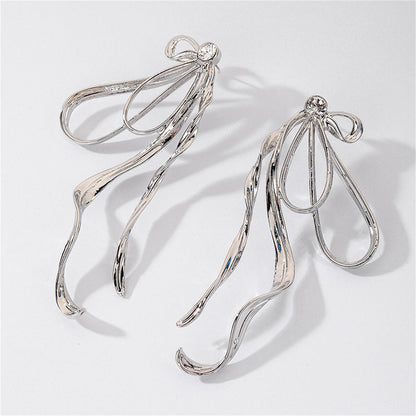 Cubic Zirconia and Silver-Plated Twist Bow Drop Earrings, silver drop earrings for women, everyday style, side view
