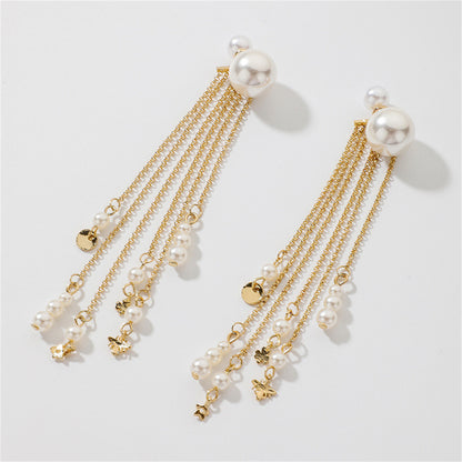 White Pearl and 18K Gold-Plated Tassel Ear Jackets, gold drop earrings for women, botanical inspired, detail close-up