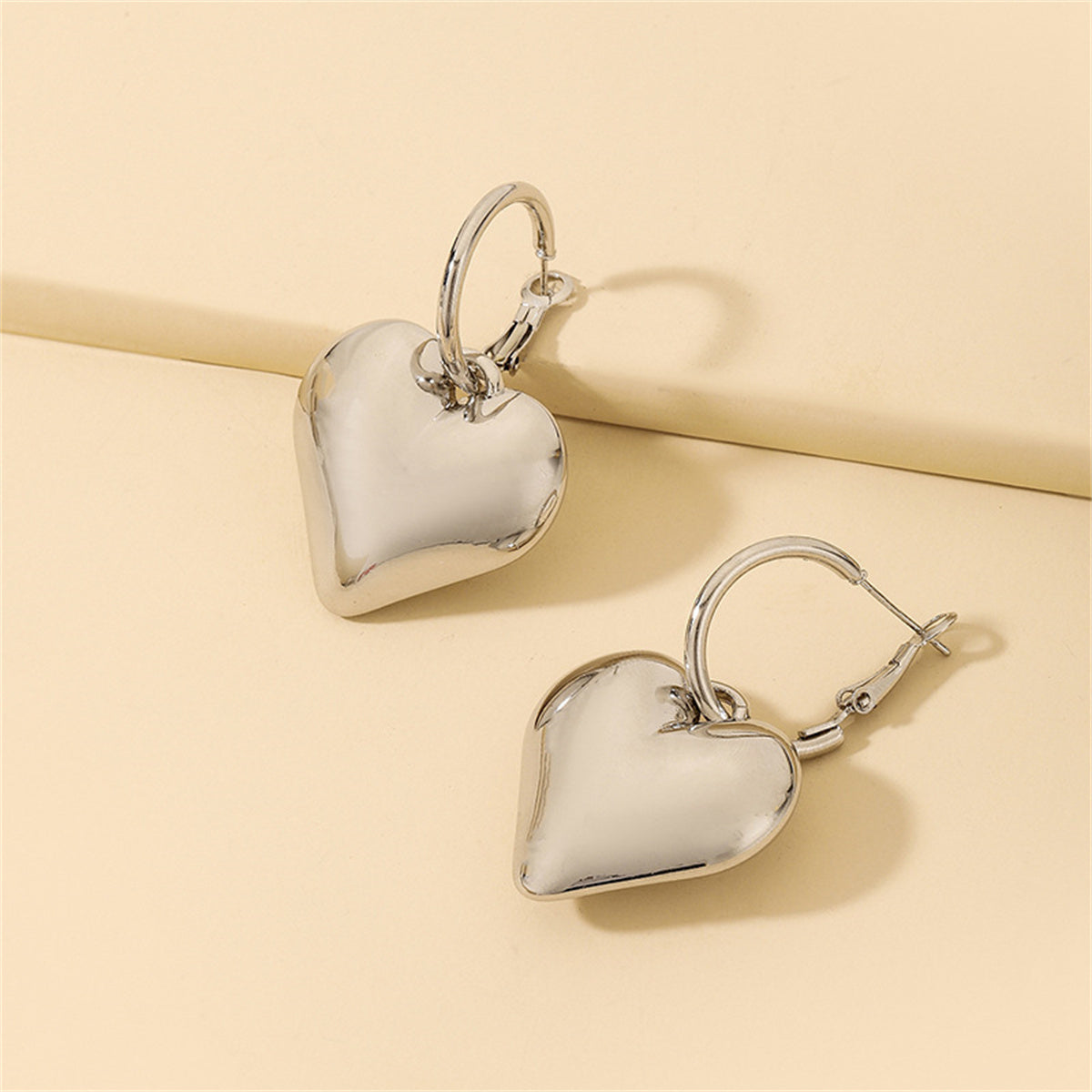 Silver-Plated Heart Huggie Earrings