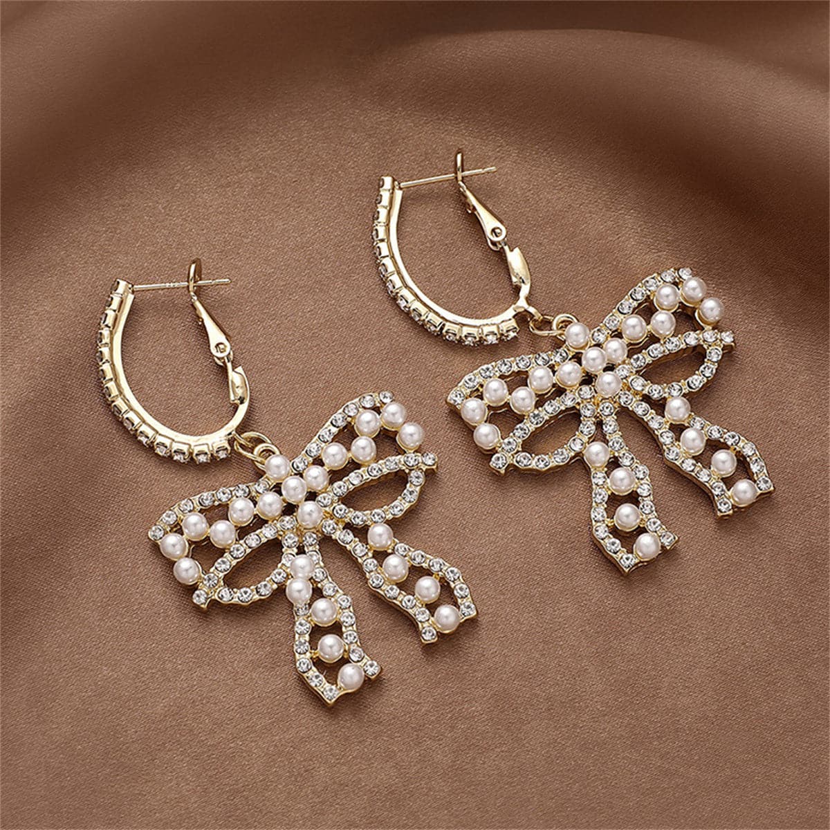 Cubic Zirconia and Pearl Bow Huggie Drop Earrings, huggie earrings, botanical inspired, side view