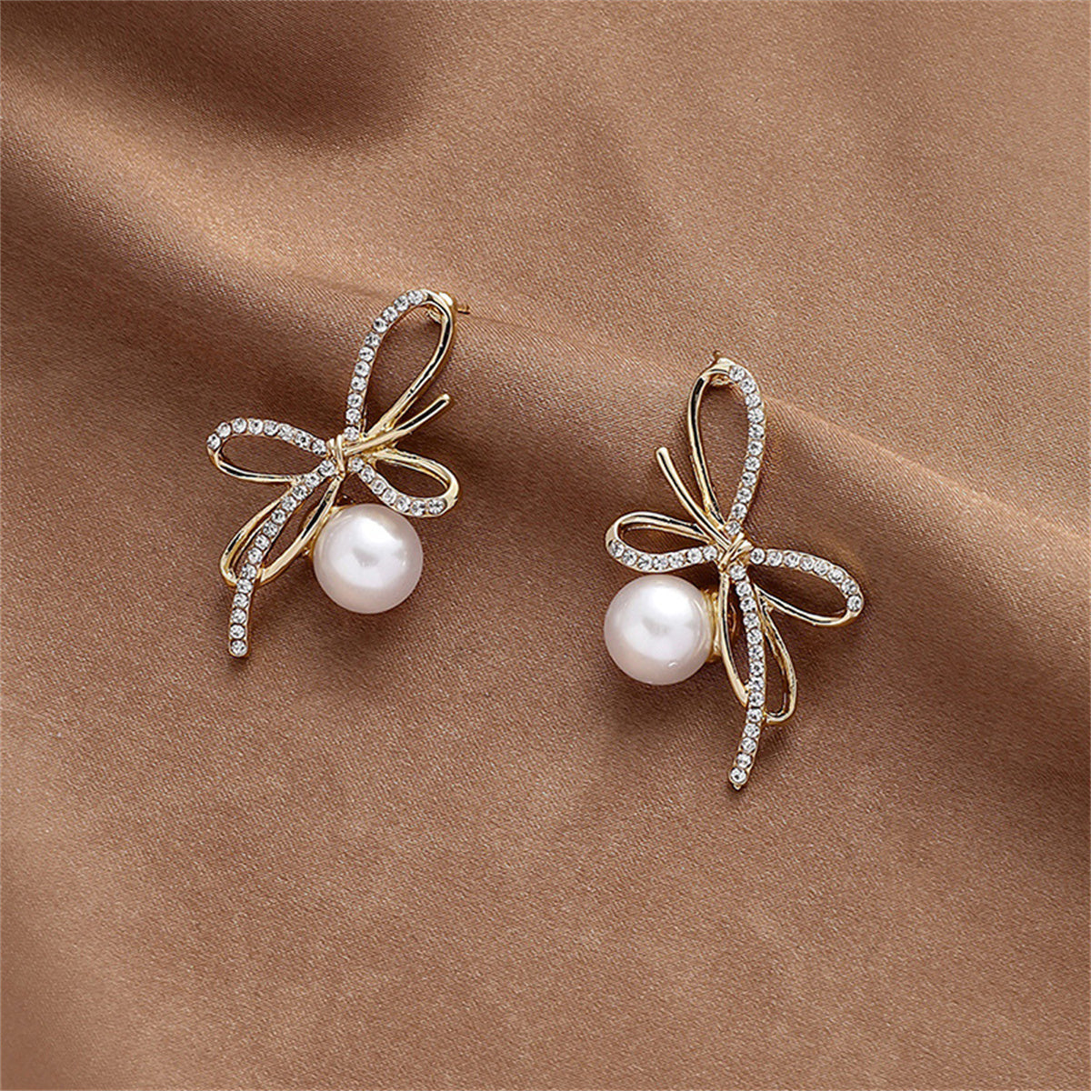 Cubic Zirconia and Pearl 18K Gold-Plated Bow Stud Earrings, gold drop earrings for women, everyday style, detail close-up