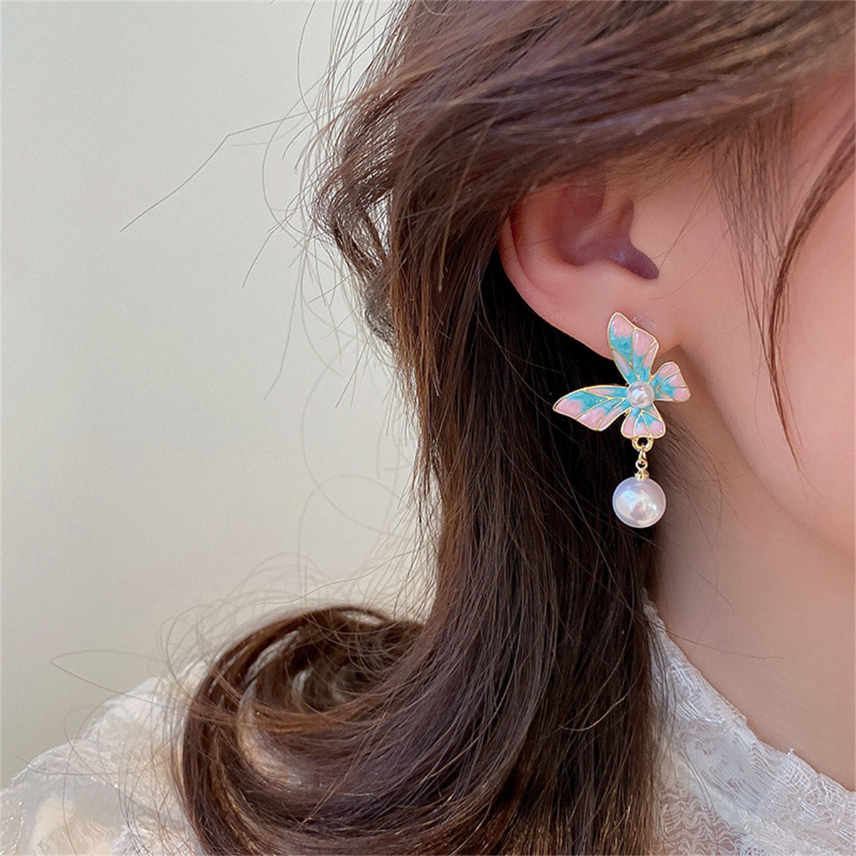 Blue Enamel and Pearl Butterfly Bead Drop Earrings, drop earrings for women, dainty minimalist design, lifestyle look