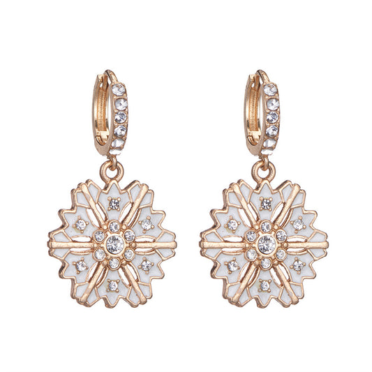 Cubic Zirconia and 18K Gold-Plated Snowflake Huggie Earrings, gold huggie earrings, vintage-inspired design, front view