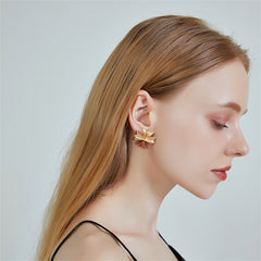 Stunning gold cross stud earrings, beautifully crafted in 18K gold plating, ideal for adding a touch of elegance.