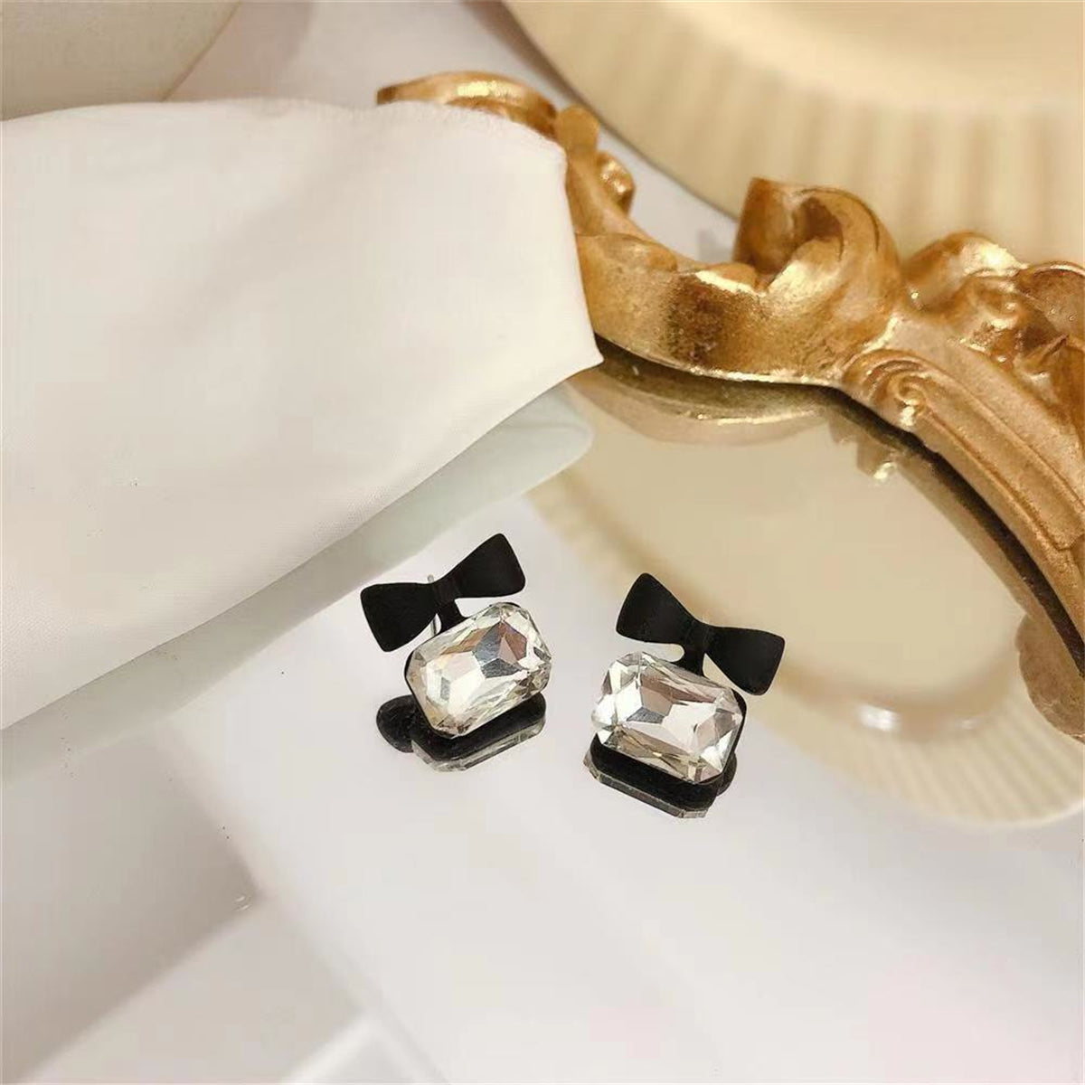 Crystal and Black Enamel Silver-Plated Bow Stud Earring, silver drop earrings for women, detail close-up