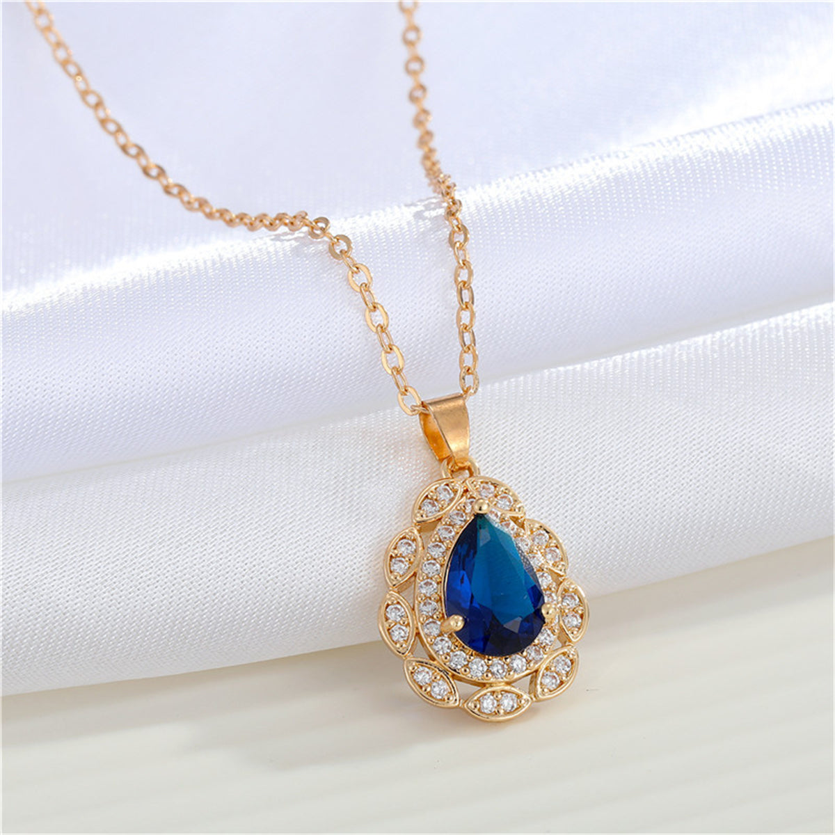 Blue Crystal and Clear Cubic Zirconia Hola Pendant Necklace, pendant necklace for women, everyday style, front view