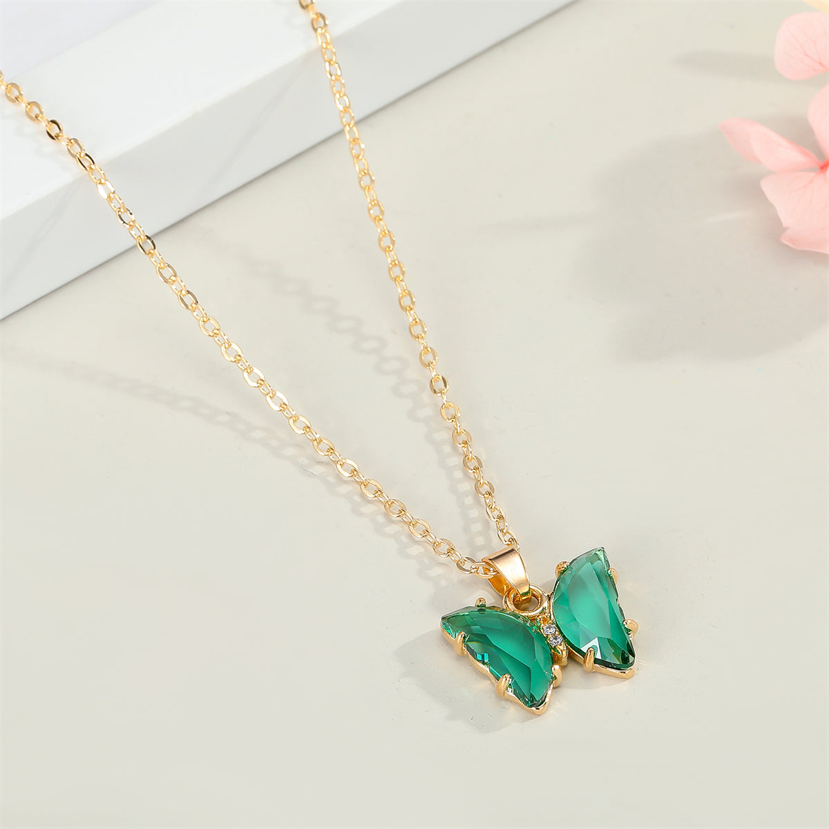 Green Crystal and Cubic Zirconia Butterfly Pendant Necklace, pendant necklace for women, vintage-inspired design, front view
