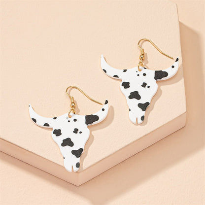 White Acrylic and 18K Gold-Plated Longhorn Drop Earring, gold drop earrings for women, botanical inspired, detail close-up
