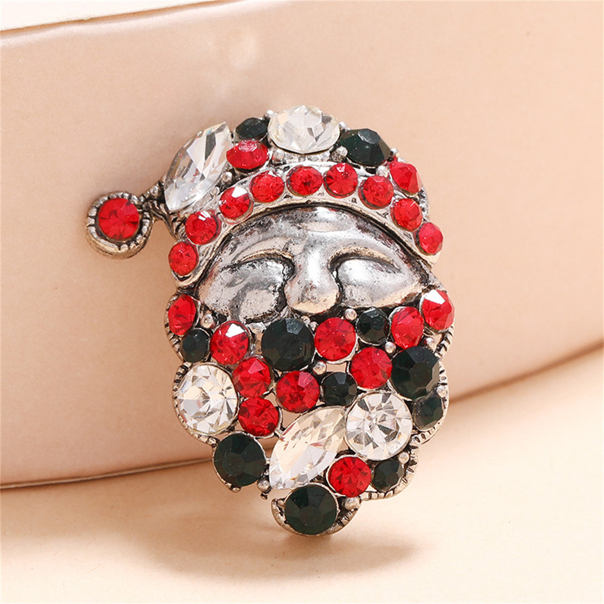 Green Cubic Zirconia and Silver-Plated Santa Brooch, silver brooch pin, botanical inspired, front view