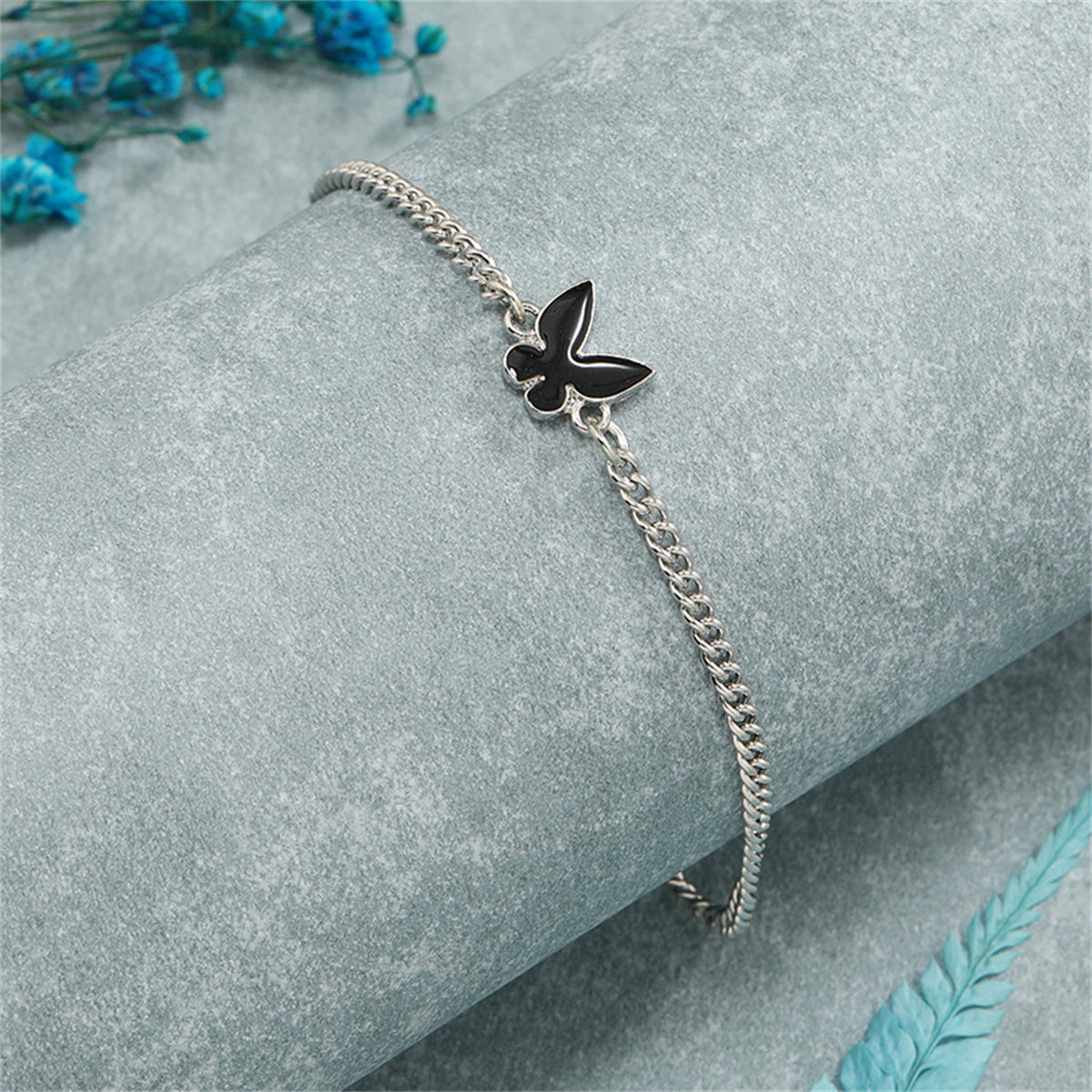 Black Enamel and Silver-Plated Butterfly Charm Bracelet, silver bracelet for women, vintage-inspired design, styled look