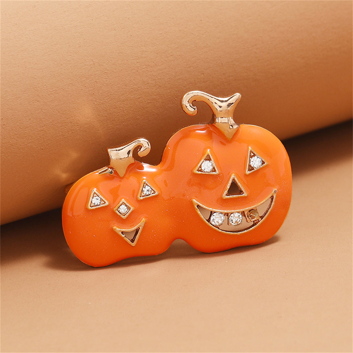 Cubic Zirconia and Orange Jack-O'-Lantern Brooch, brooch pin, vintage-inspired design, front view