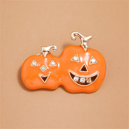 Cubic Zirconia and Orange Jack-O'-Lantern Brooch, brooch pin, vintage-inspired design, detail close-up