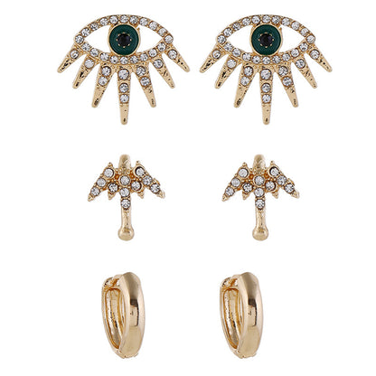 Cubic Zirconia and 18K Gold-Plated Eye Stud Earrings Set, gold huggie earrings, vintage-inspired design, detail close-up