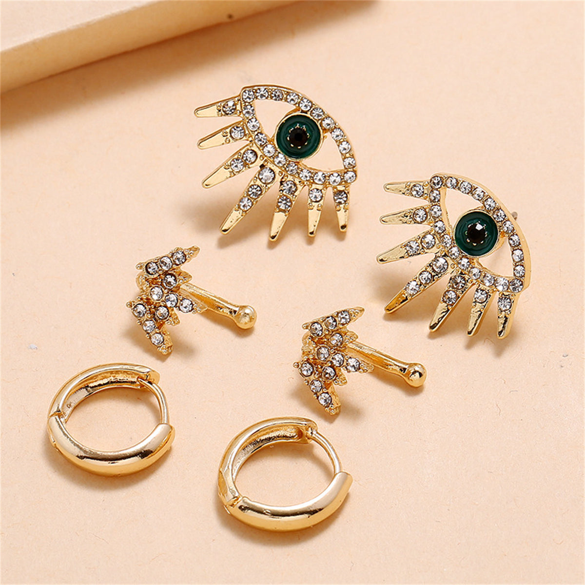 Cubic Zirconia and 18K Gold-Plated Eye Stud Earrings Set, gold huggie earrings, vintage-inspired design, lifestyle look