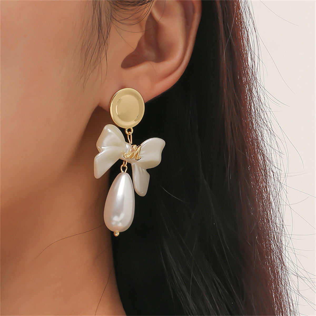 Pearl and 18K Gold-Plated Bow Drop Earrings, gold drop earrings for women, vintage-inspired design, lifestyle look
