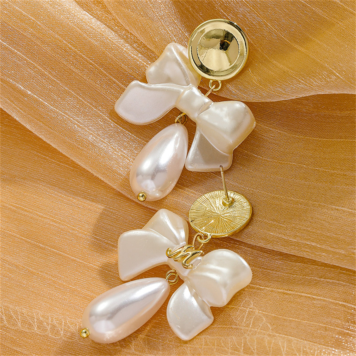 Pearl and 18K Gold-Plated Bow Drop Earrings, gold drop earrings for women, vintage-inspired design, detail close-up