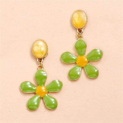 Green Enamel and 18K Gold-Plated Flower Drop Earrings, gold drop earrings for women, vintage-inspired design, lifestyle look