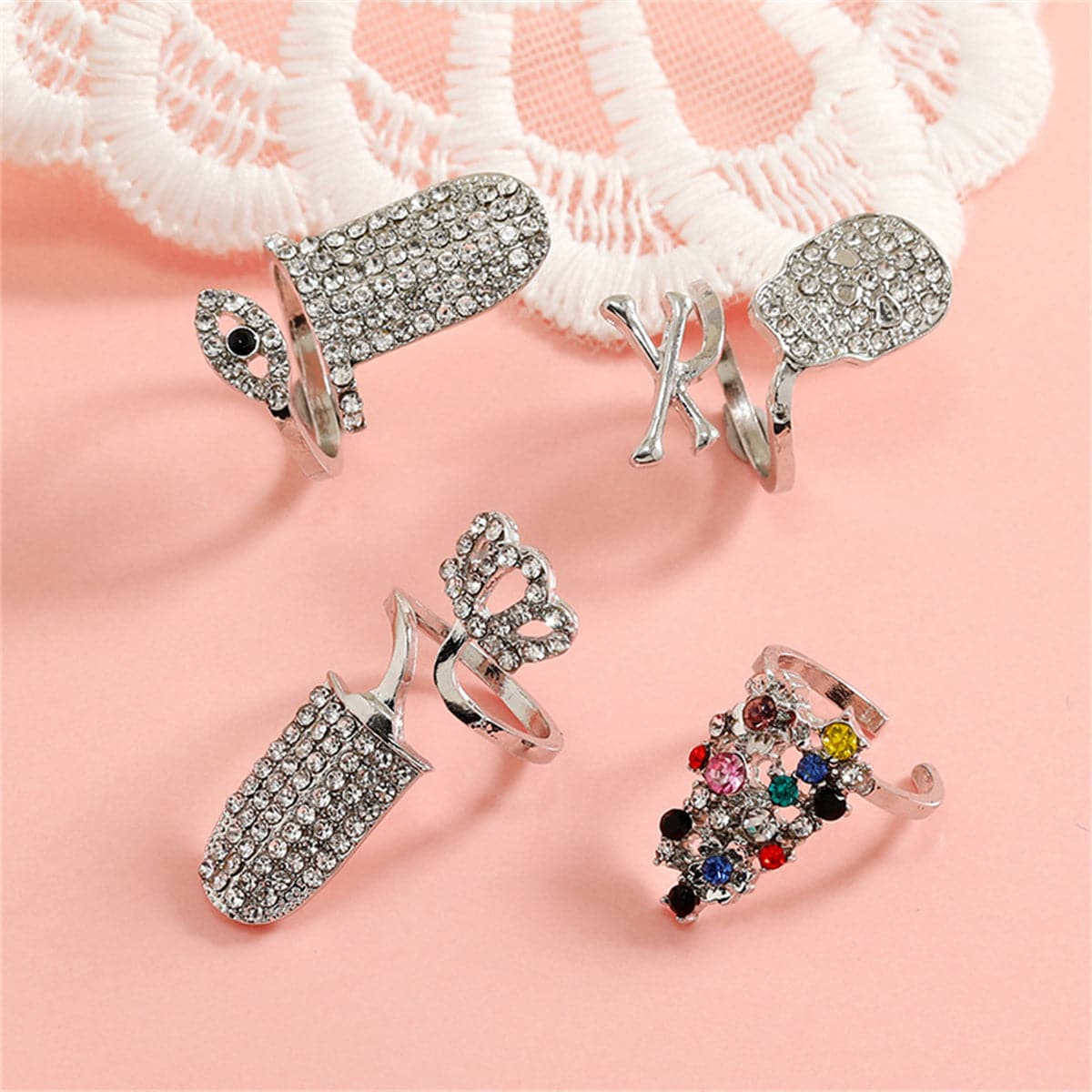 Cubic Zirconia and Silver-Plated Skull Crown Midi Ring Set, silver statement rings for women, botanical inspired, front view