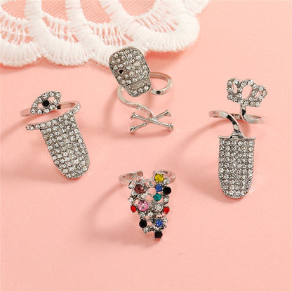 Cubic Zirconia and Silver-Plated Skull Crown Midi Ring Set, silver statement rings for women, detail close-up