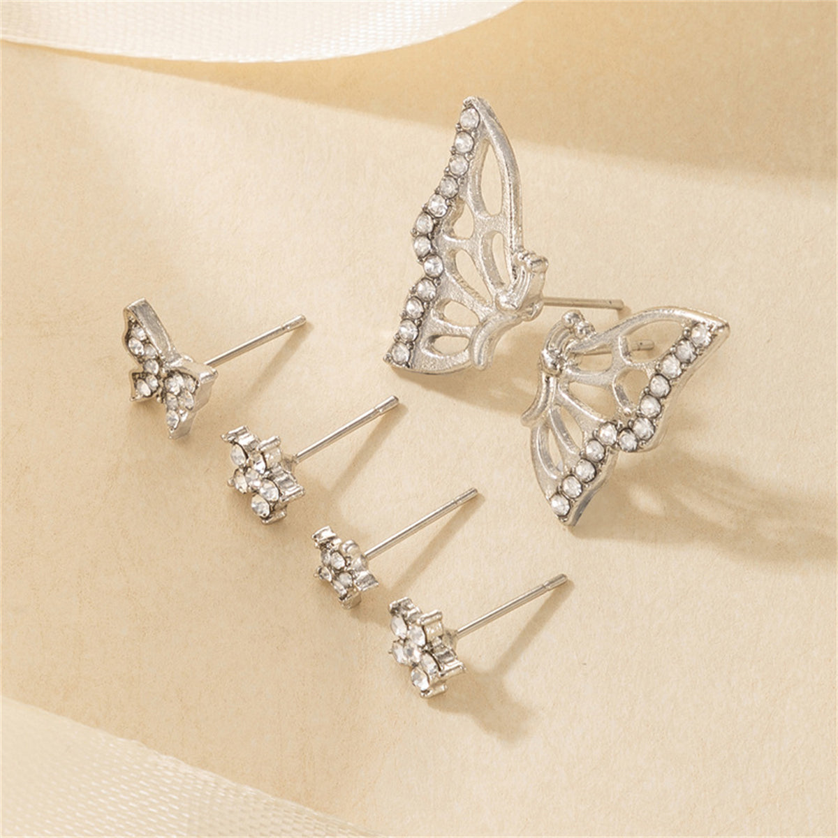 Cubic Zirconia and Silver-Plated Butterfly Earrings Set, silver stud earrings for women, everyday style, side view