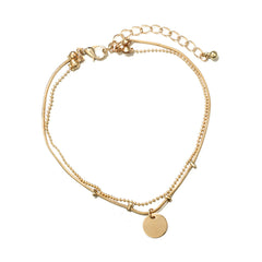 Chic 18K gold-plated anklet adorned with disc charms, ideal for elevating your accessory game effortlessly.