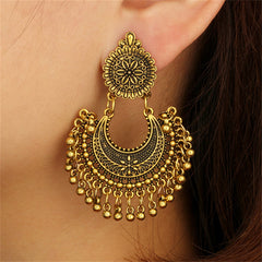 Elegant 18K gold-plated boho drop earrings featuring intricate designs, perfect for adding a touch of sophistication to any outfit.