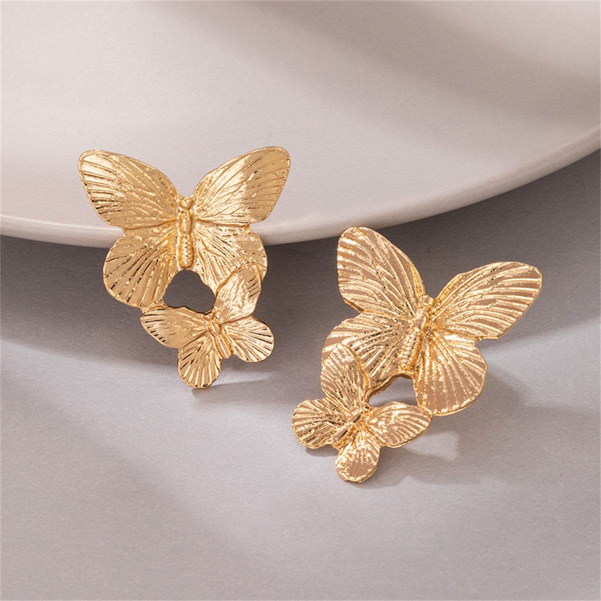 18K Gold-Plated Double-Butterfly Dangle Earrings, gold drop earrings for women, dainty minimalist design, detail close-up