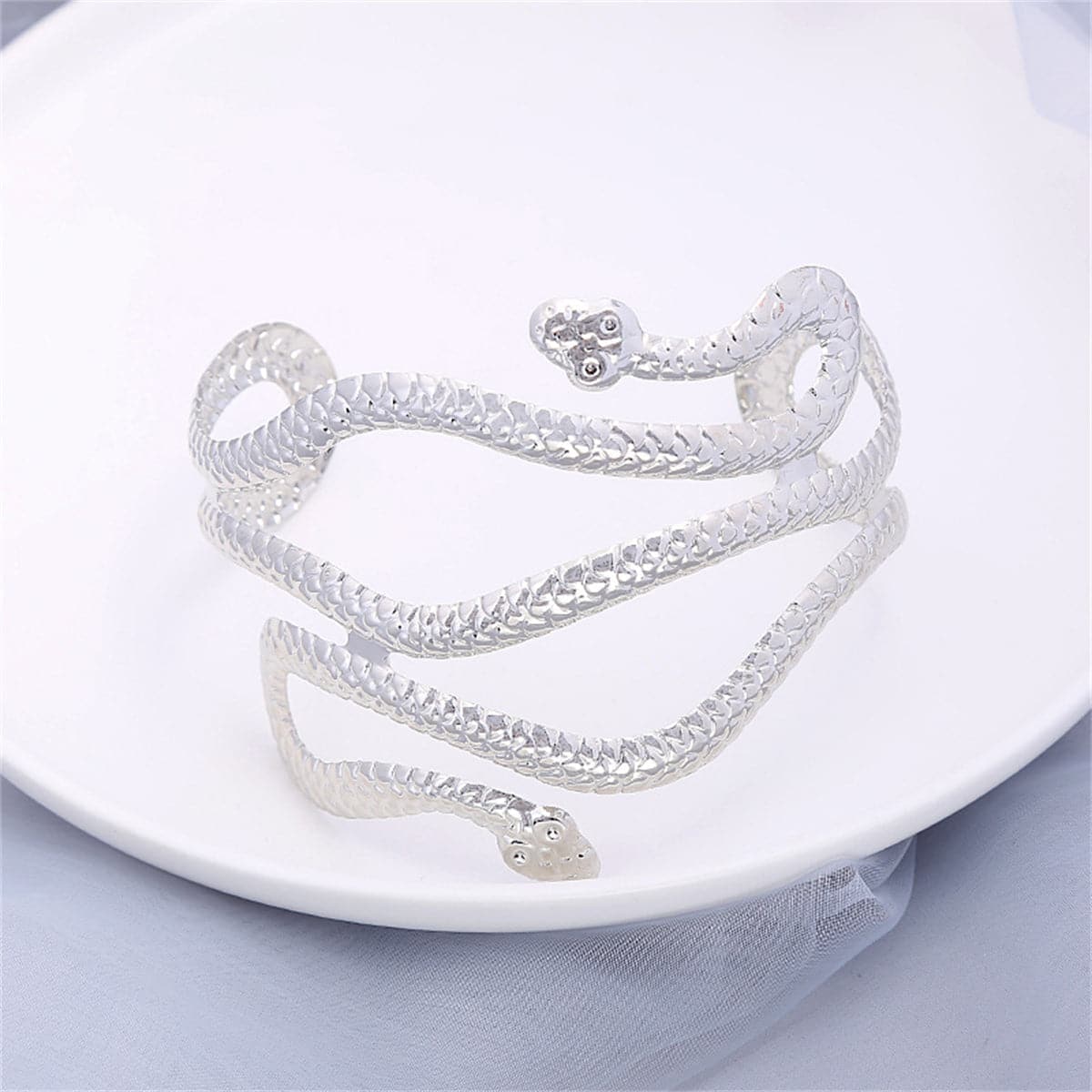 Silver-Plated Serpentine Arm Cuff, botanical inspired, front view
