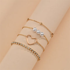 Elegant display of three gold chains with pearls and heart charms, complemented by a stunning 18K gold-plated tennis bracelet set.