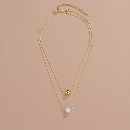 Pearl and 18K Gold-Plated Bead Layered Necklace, gold pendant necklace for women, botanical inspired, detail close-up