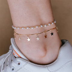 An 18K gold-plated anklet adorned with stars and pearls, showcasing a stylish tassel for added elegance.