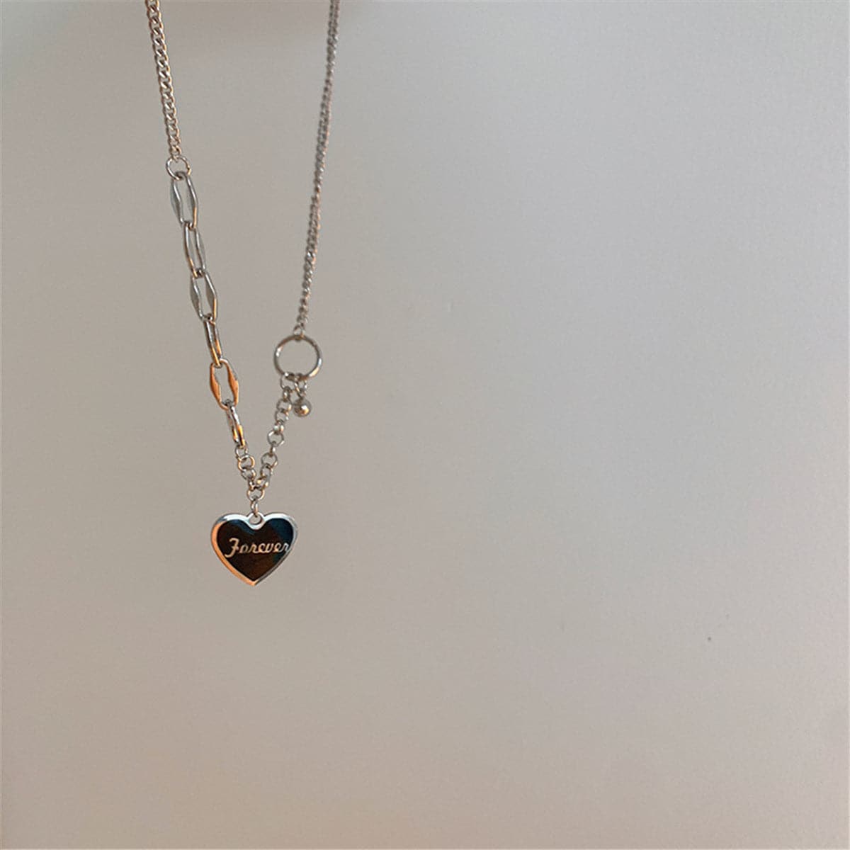 Black and Stainless Steel 'Forever' Heart Patchwork Pendant Necklace, stainless steel pendant necklace for women, side view