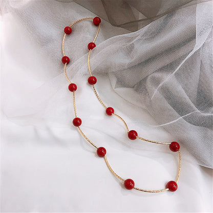 Red Pearl and 18K Gold-Plated Ball Station Bracelet, gold bracelet for women, botanical inspired, detail close-up