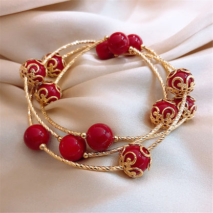 Red Pearl and 18K Gold-Plated Floral Ball Station Bracelet, gold bracelet for women, everyday style, side view