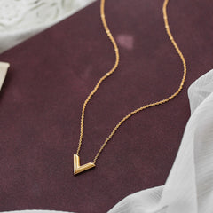 Chic 18K gold-plated 'V' pendant necklace, ideal for elevating your everyday look with sophistication.
