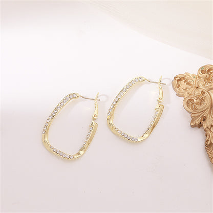 Cubic Zirconia and 18K Gold-Plated Twisted Oval Leverback Earrings, gold drop earrings for women, detail close-up