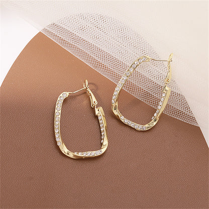 Cubic Zirconia and 18K Gold-Plated Twisted Oval Leverback Earrings, gold drop earrings for women, styled look