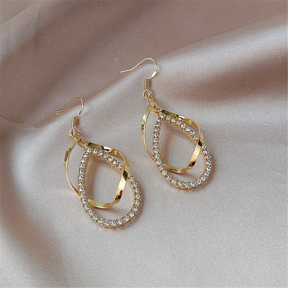 Cubic Zirconia and 18K Gold-Plated Twisted Teardrop Earrings, gold drop earrings for women, detail close-up