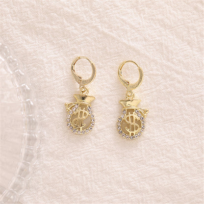 Cubic Zirconia and 18K Gold-Plated Wallet US Dollars Sign Drop Earrings, gold huggie earrings, detail close-up