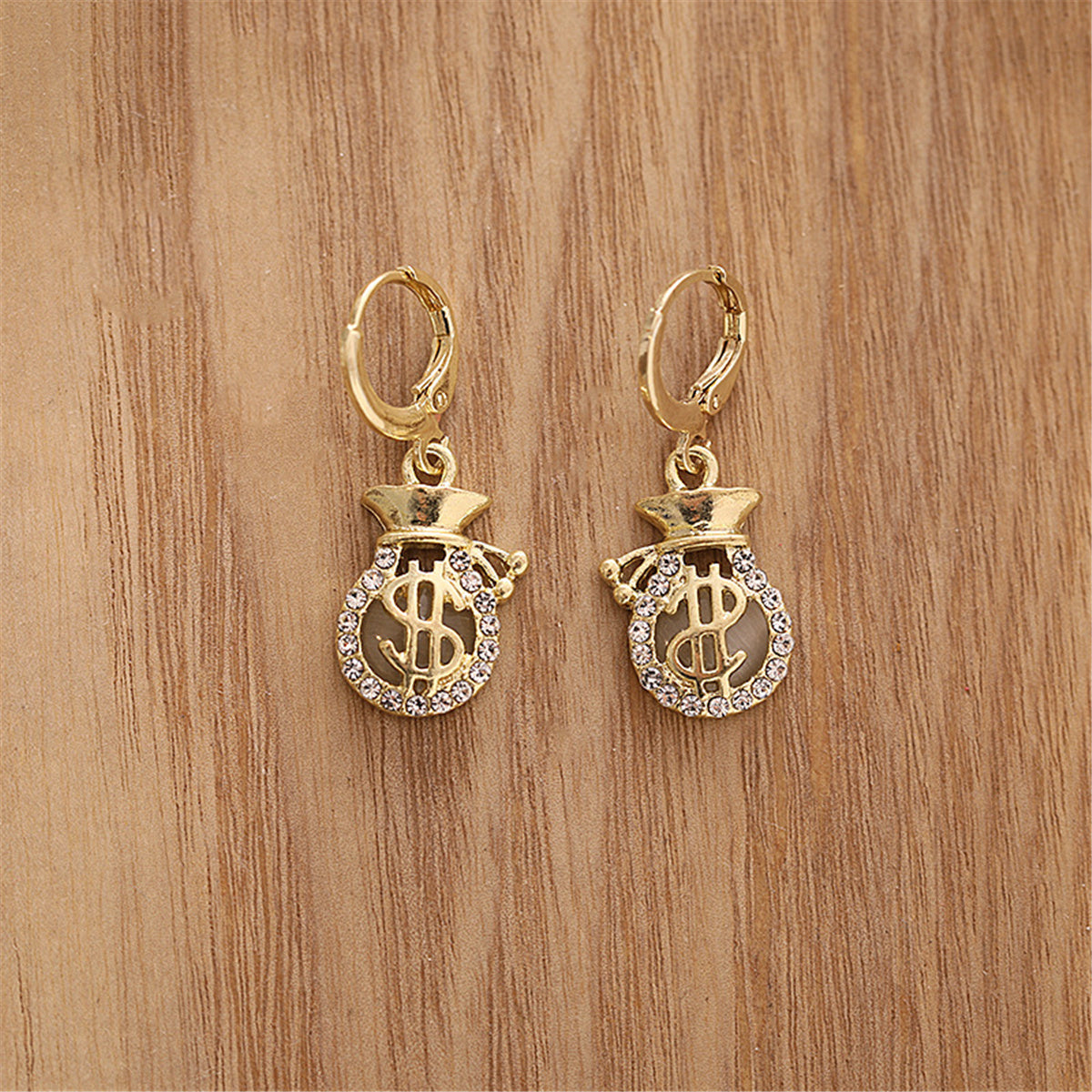 Cubic Zirconia and 18K Gold-Plated Wallet US Dollars Sign Drop Earrings, gold huggie earrings, lifestyle look