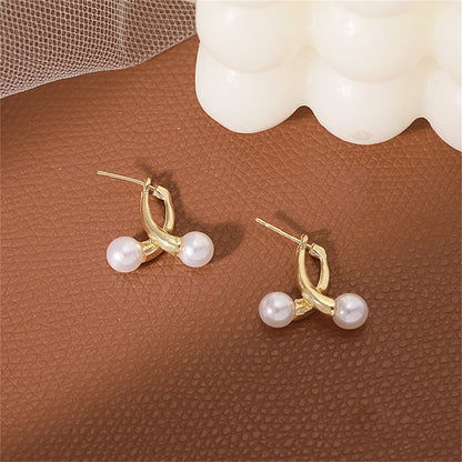 Pearl and 18K Gold-Plated Overlapping Ear Jackets, gold stud earrings for women, vintage-inspired design, front view
