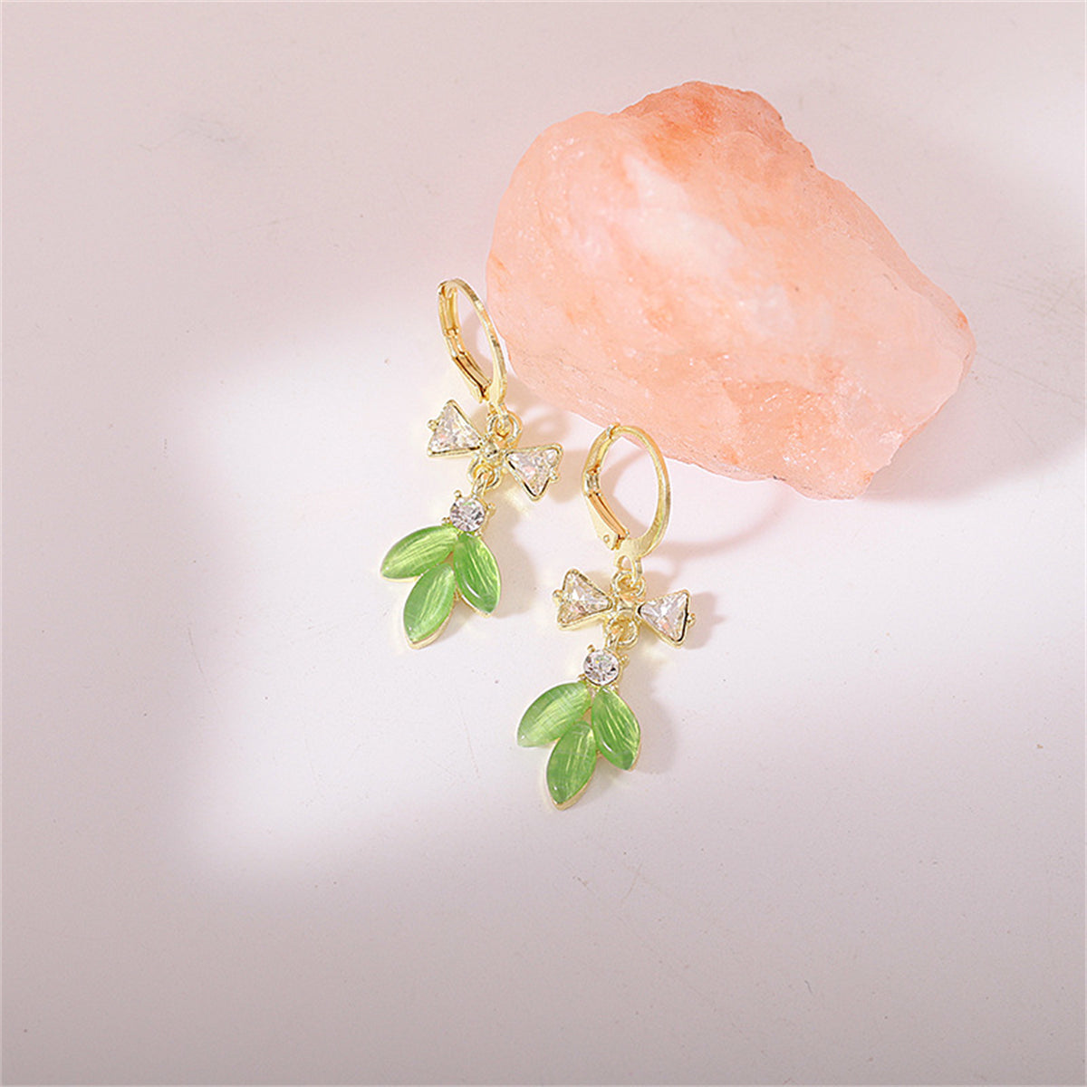 Green Cat's Eye and Cubic Zirconia Bow Leaves Huggie Earrings, huggie earrings, botanical inspired, detail close-up