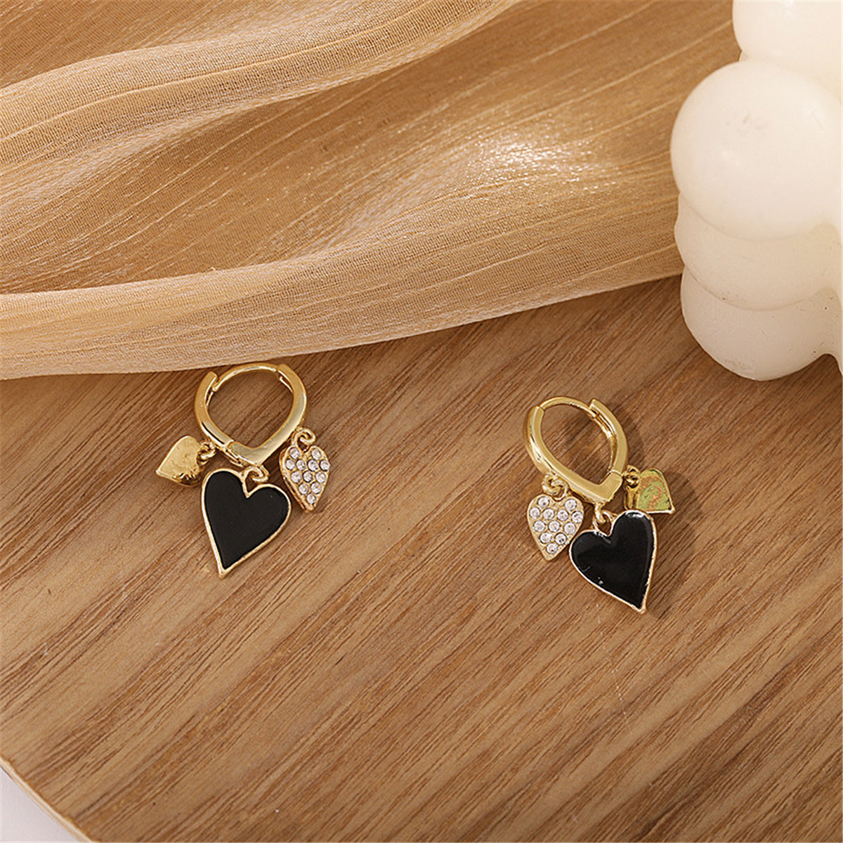 Black Enamel and Cubic Zirconia 18K Gold-Plated Hearts Huggie Earrings, gold huggie earrings, elegant gift for her, side view