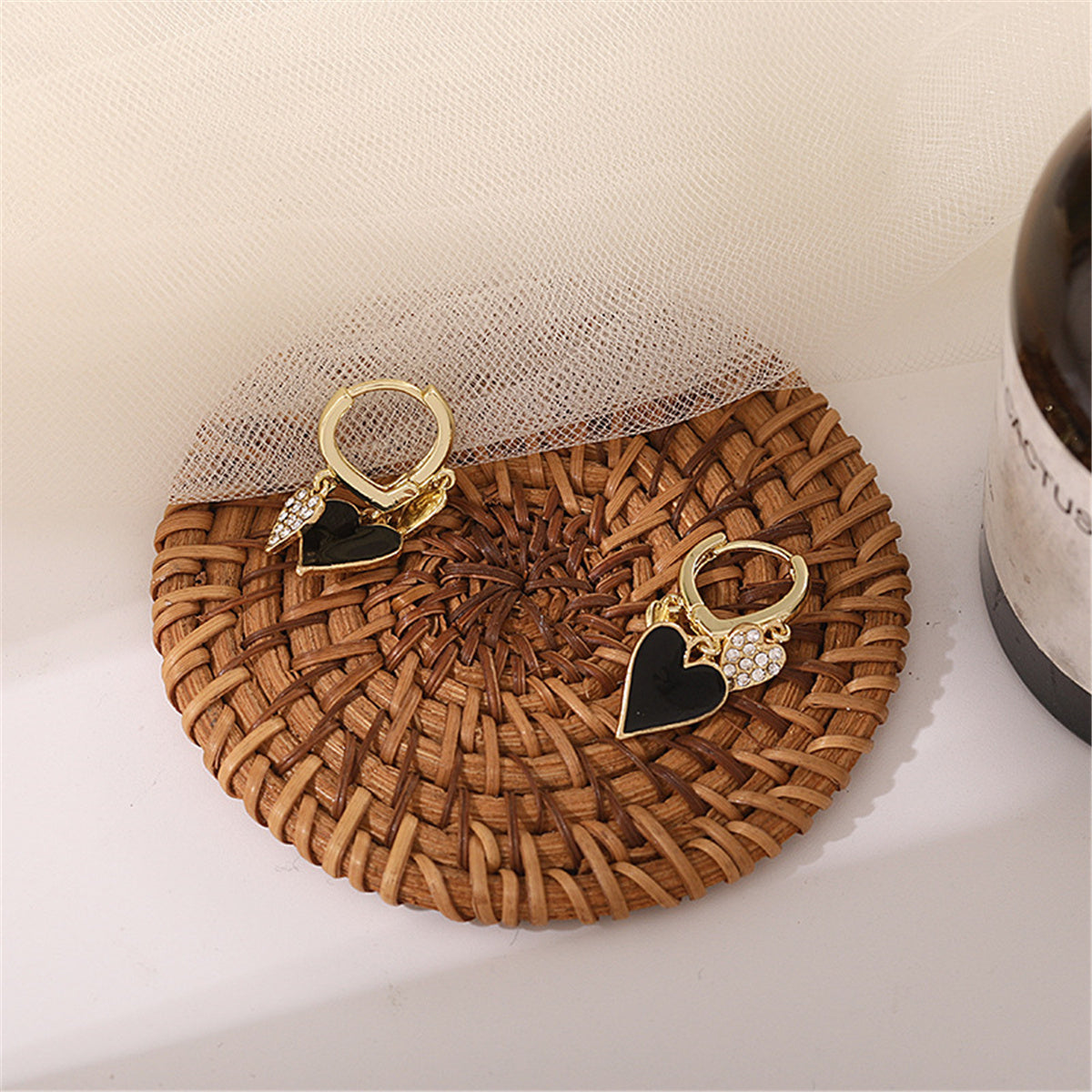 Black Enamel and Cubic Zirconia 18K Gold-Plated Hearts Huggie Earrings, gold huggie earrings, detail close-up