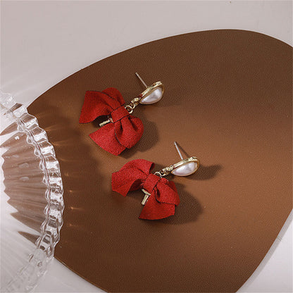 Pearl and Polyster 18K Gold-Plated Bow Drop Earring, gold drop earrings for women, dainty minimalist design, lifestyle look