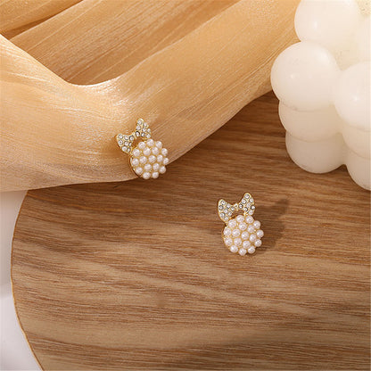 Cubic Zirconia and Pearl Bow Round Stud Earrings, stud earrings for women, vintage-inspired design, lifestyle look