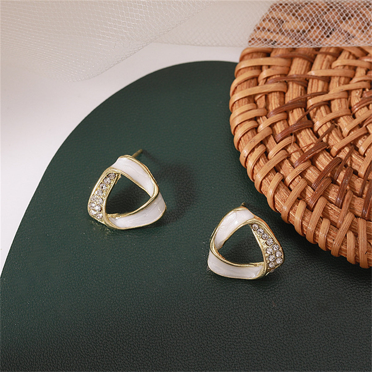 Cubic Zirconia and 18K Gold-Plated Twisted Triangle Stud Earrings, gold stud earrings for women, detail close-up