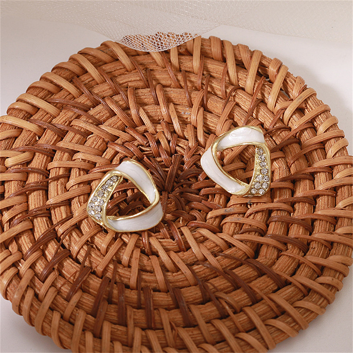 Cubic Zirconia and 18K Gold-Plated Twisted Triangle Stud Earrings, gold stud earrings for women, lifestyle look