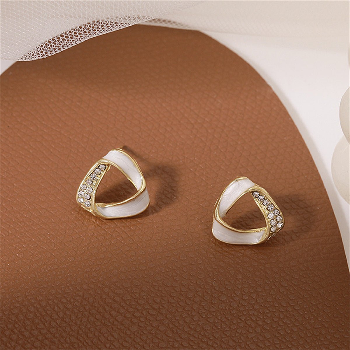 Cubic Zirconia and 18K Gold-Plated Twisted Triangle Stud Earrings, gold stud earrings for women, everyday style, side view